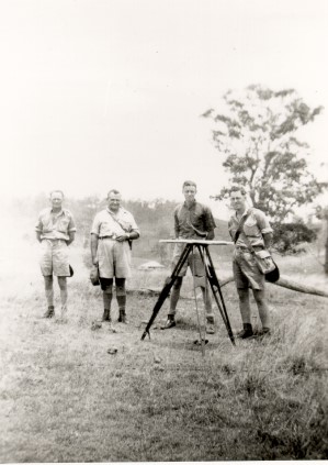 Army warrant officer Vic Aldred, second from left, instructing potential surveyors in the art of plane tabling